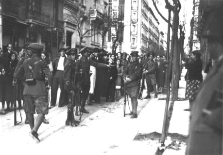 In Madrid, troops guarding a baker's shop
