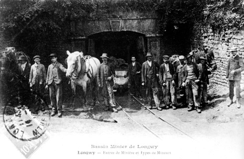 Postcard showing miners entering the mineral basin of Longwy