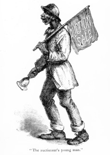 Black man announcing an auction sale