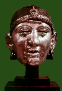 Parade helmet in form of a man's head, with a mask representing the whole face