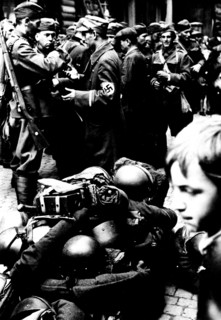 In a village of the Sudetes, Czech troops are waiting for the relief German troops