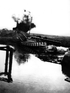 Near the city of Dixmude, the destroyed railroad bridge on the Yser river