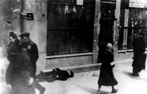 Ghetto in Warsaw. Man who died of hunger in the street