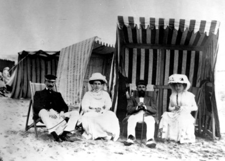 Wealthy couples spending their holidays at seaside