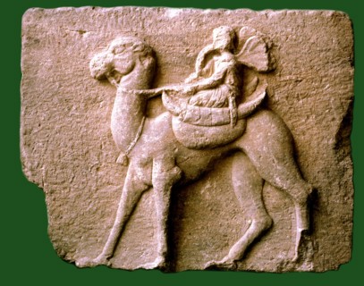 Winged genius on camel back