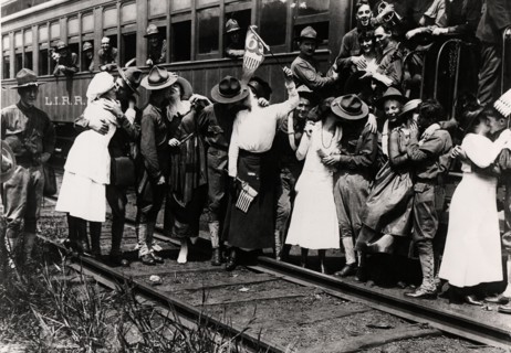 Women saying goodbye to soldiers
