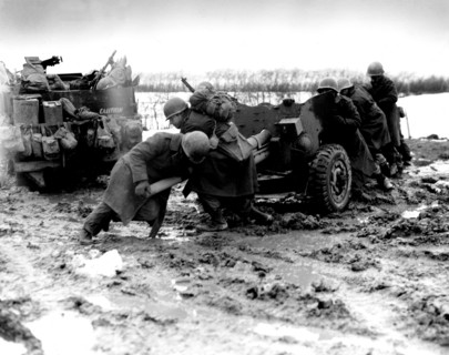 Liberation of France: Troops installing a cannon near Butgenbach, 1944
