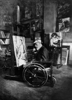 1914, Renoir painting in his wheelchair