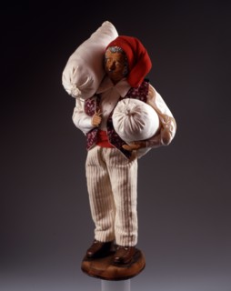 Christmas figure from Provence: miller carrying sacks of wheat
