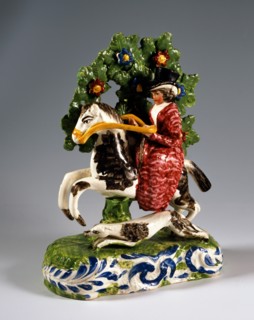 Woman riding a horse with a dog alongside (The hunt)