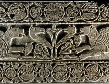 Animals facing each other around the tree of life (detail)