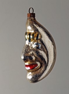Christmas bauble in the shape of a crescent moon