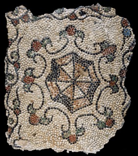 Mosaic fragment with stylized flower decoration