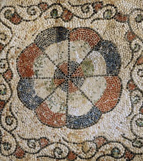 Mosaic fragment with stylized flower decoration
