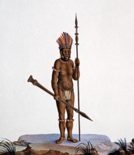 Indigenous Uerequena adorns with feathers, carrying her spear