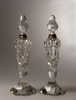 Crystal and silver perfume bottles.