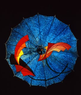 Blue felt umbrella, with geometric decoration in a futuristic style