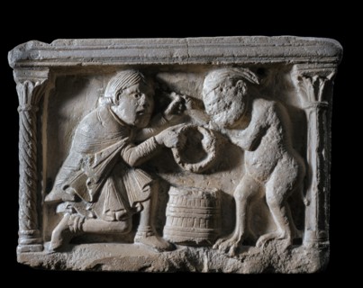 Marble stoup representing the legend of the 'Pact between the Knight and the Devil'