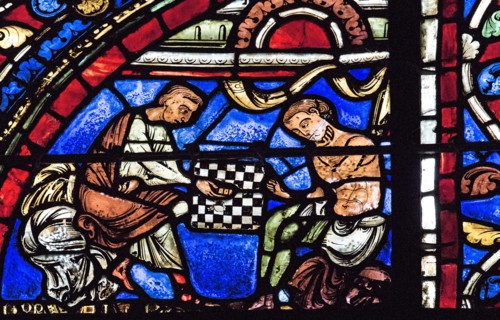 Parabole du fils prodigue : les risques du jeu (vitrail de Chartres)