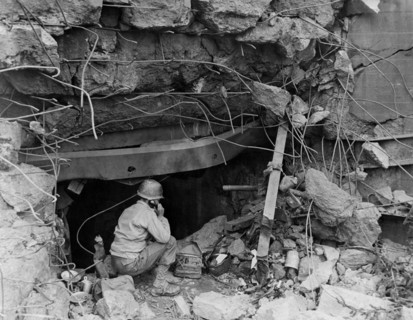 German pillbox becomes American telephone booth  in France (Autumn 1944)
