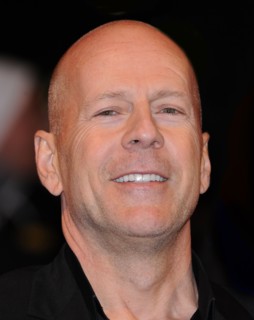 Bruce Willis with Dame Helen Mirren arriving for the European  Premiere of the film RED at the