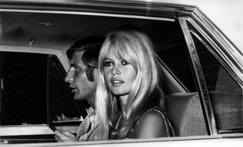 Desperately in love for the third time, sex kitten BRIGITTE BARDOT (31) got married in a hurry in