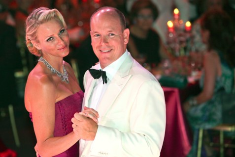 Prince Albert II of Monaco and his wife, Princess Charlene of Monaco, dance at the 63rd Red Cross