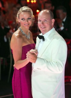 Prince Albert II of Monaco and his wife, Princess Charlene of Monaco, dance at the 63rd Red Cross