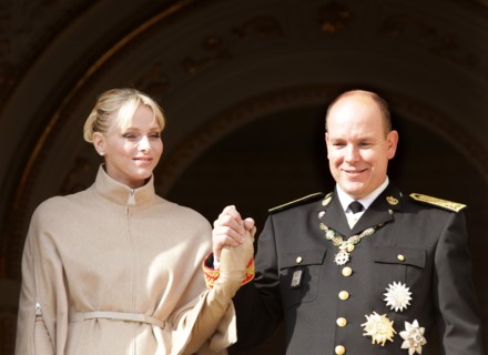 Prince Albert II of Monaco and his wife Princess Charlene greet from the balcony of the palace of