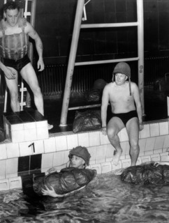 Canadian soldiers exercise in indoor swimming pool