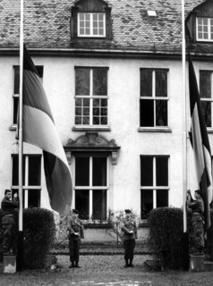 German and French national flags in front of French headquarters building in Tübingen