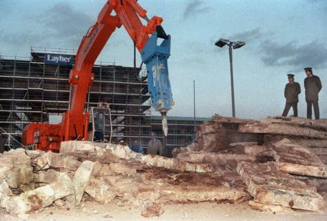 Tearing down the Berlin Wall