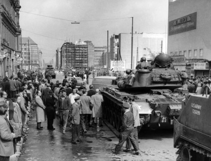 US soldiers and People's Police officers at checkpoint Friedrichstraße in Belrin 1961
