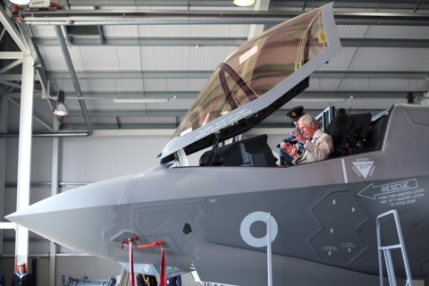 Britain's Prince Charles sits in the cockpit of a F-35 fighter jet during a visit to 617 Squadron, the UK's first F-35 Lightning Squadron based at RAF Marham