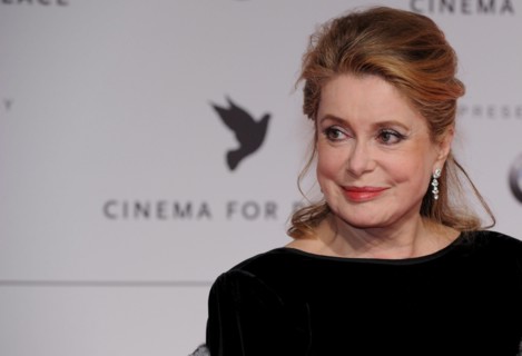 French actress Catherine Deneuve arrives at the 'Cinema
for Peace' gala at the 59th Berlin