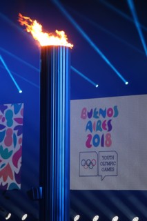 HANDOUT - 06 October 2018, Argentina, Buenos Aires: The Olympic flame burns during the opening