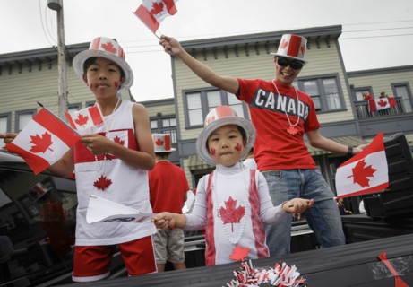 (180701) -- RICHMOND, July 1, 2018 () -- Local residents wave the national flag of Canada during