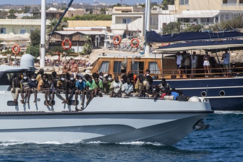 Migrants arriving on Lampedusa Island