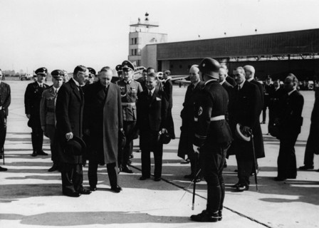 British Premier Neville Chamberlain returns to London after the second meeting with Hitler in