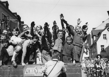 The Nazi propaganda picture shows Sudeten German children doing the Nazi salute in As, Czech