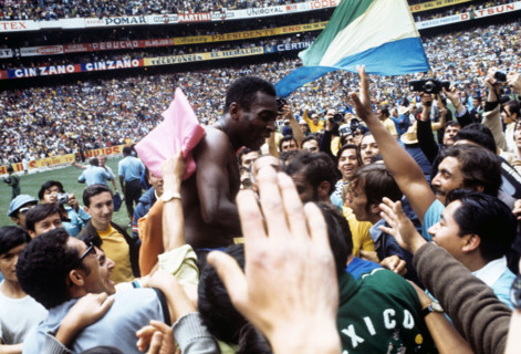 Brazil wins the 1970 Soccer World Cup in Mexico City, on 21 June 1970. Pele is celebrated by fans.