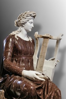 Statue of the goddess Rome playing a zither