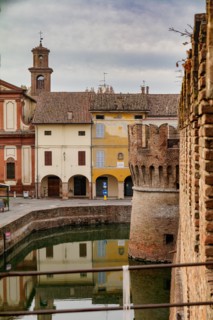 Fontanellato, Rocca Sanvitale: view of the fortress and its moat, and some houses