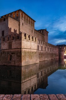 Fontanellato, Rocca Sanvitale: night view of the fortress and its moat