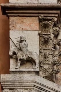 Ferrara, the Cathedral dedicated to St. George, façade detail with knight.