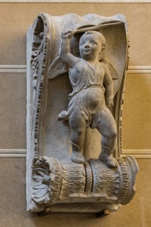 Mantelpiece in relief with figure of a Cupid