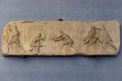 Roman slab representing a Sagittarii fighting