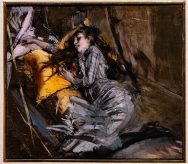 “Reclining Girl in Tartan Dress” by Giovanni Boldini