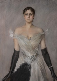 “Portrait of a lady in white with gloves and fan” by Giovanni Boldini