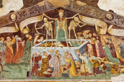 Clusone, Oratory of Disciplini or St. Bernardino, façade: frescoes with the Triumph of Death on